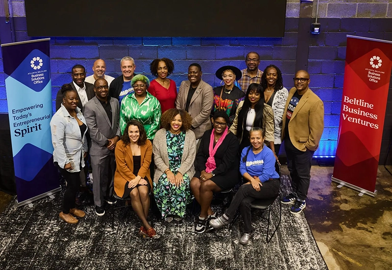 Beltline Business Ventures banner image showing a group photo at a conference