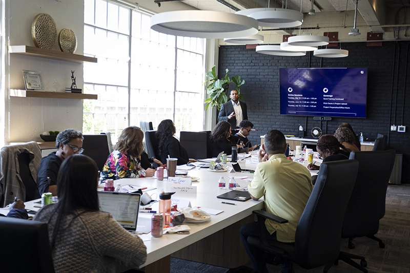 A company meeting at one of Lendistry's meeting rooms in Los Angeles, CA